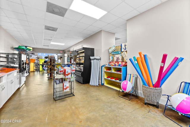 miscellaneous room with a drop ceiling