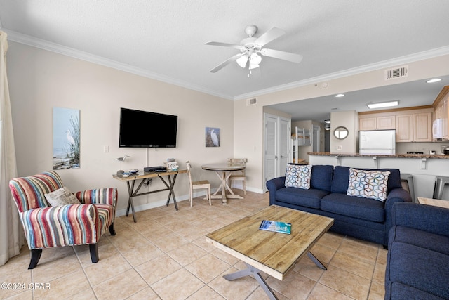 living room with crown molding, light tile patterned floors, a textured ceiling, and ceiling fan