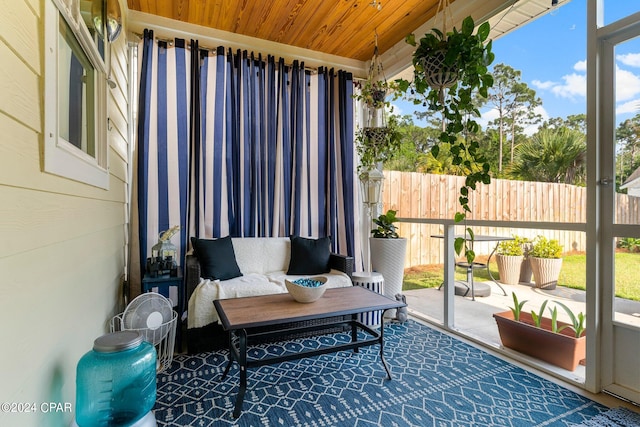 sunroom with wooden ceiling