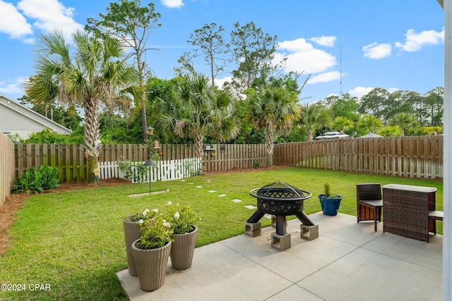 view of patio featuring an outdoor fire pit