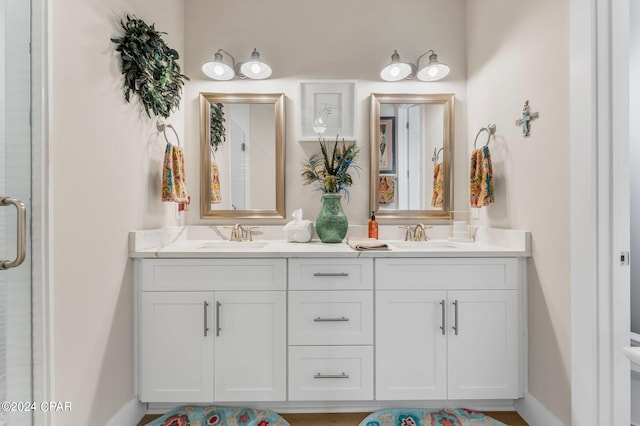 bathroom featuring double vanity