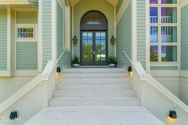 entrance to property featuring french doors