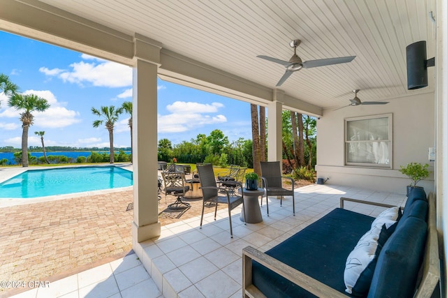 view of patio featuring ceiling fan