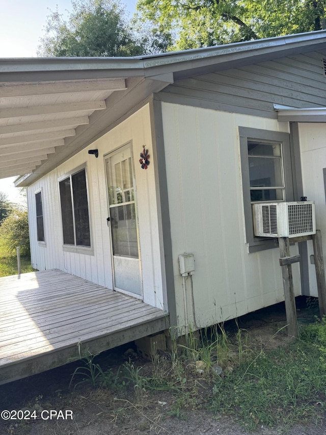 view of home's exterior featuring a deck