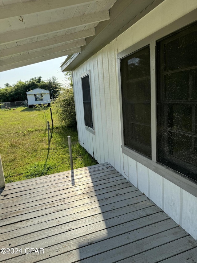 deck featuring a yard