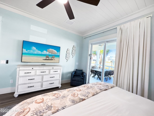 bedroom featuring dark hardwood / wood-style flooring, ornamental molding, ceiling fan, and access to exterior