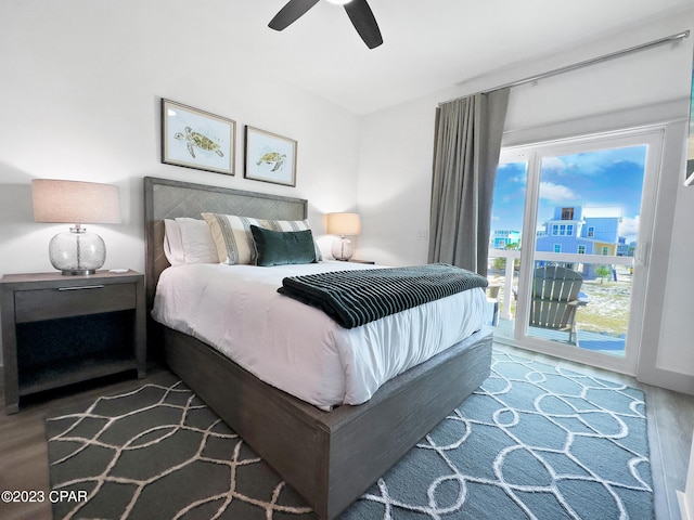 bedroom featuring wood-type flooring, ceiling fan, and access to exterior