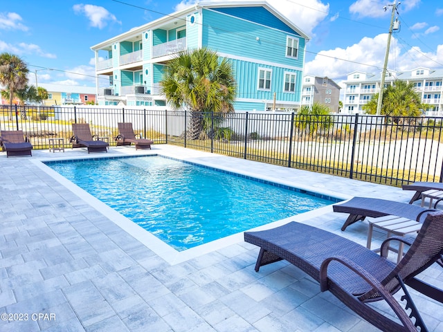 view of pool featuring a patio area