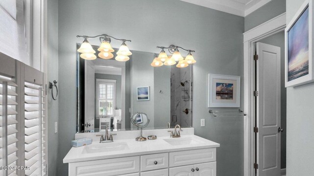 bathroom featuring vanity and an enclosed shower