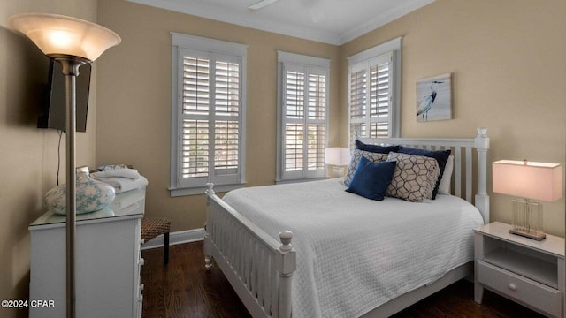 bedroom with crown molding and dark wood-type flooring