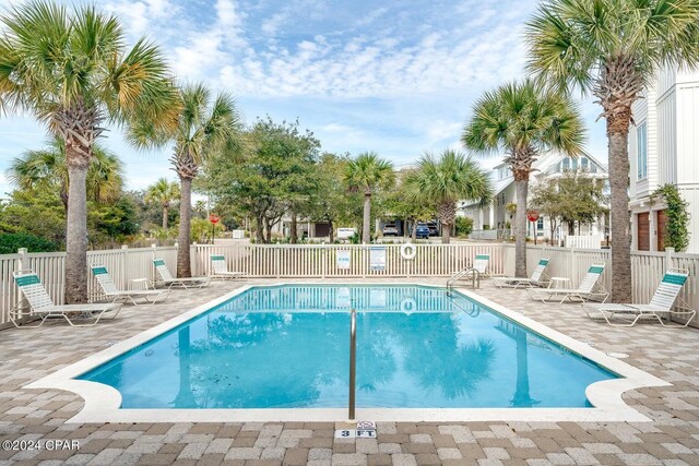 view of swimming pool featuring a patio