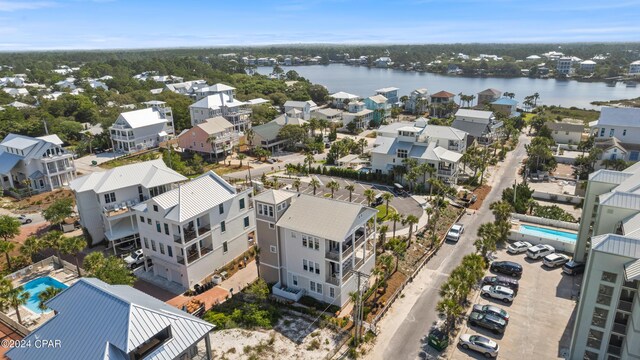 drone / aerial view with a water view