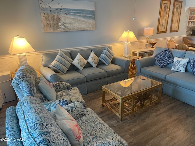 living room with dark wood-type flooring