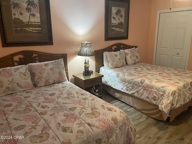 bedroom featuring hardwood / wood-style flooring