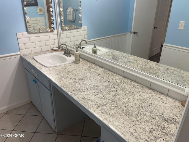 bathroom featuring tile patterned floors and vanity