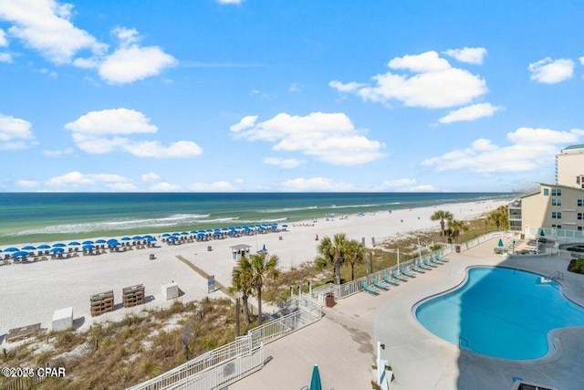 view of water feature with a beach view