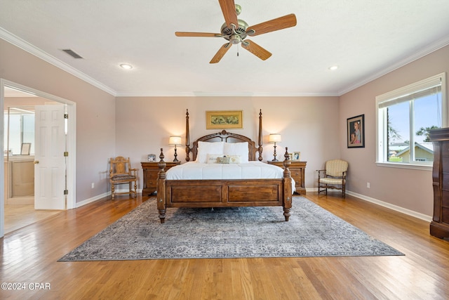 bedroom featuring crown molding, light wood-type flooring, and ceiling fan