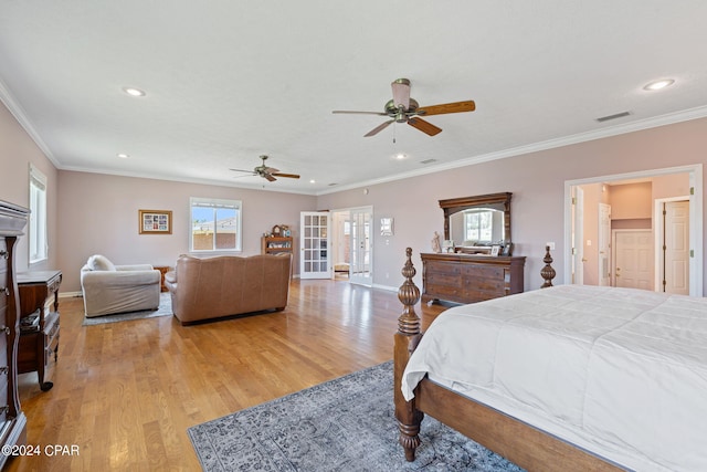 bedroom with ceiling fan, light hardwood / wood-style flooring, french doors, and crown molding