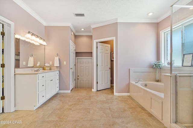 bathroom featuring tile floors, a textured ceiling, crown molding, and vanity