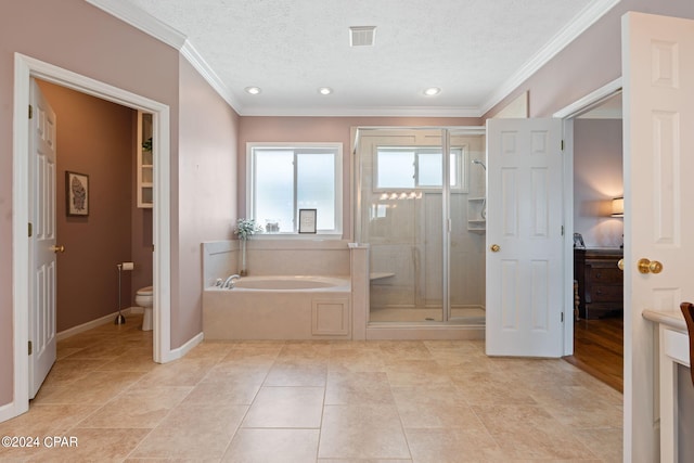 bathroom featuring tile flooring, toilet, and a textured ceiling