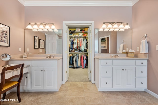 bathroom with tile floors, ornamental molding, and double sink vanity