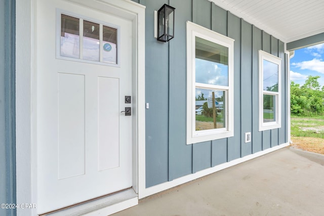 entrance to property with covered porch