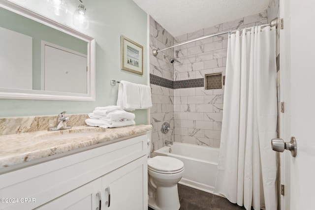 full bathroom with vanity, toilet, shower / bath combo with shower curtain, and a textured ceiling