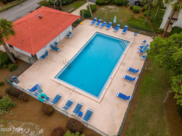 view of swimming pool featuring a patio area