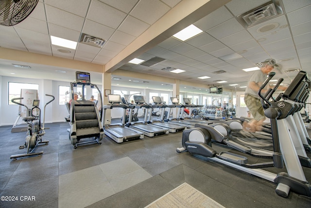 workout area with a drop ceiling