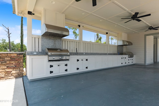 view of patio / terrace featuring grilling area, exterior kitchen, and ceiling fan