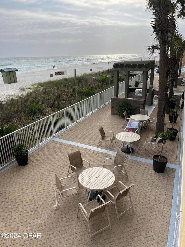 view of patio / terrace with a water view