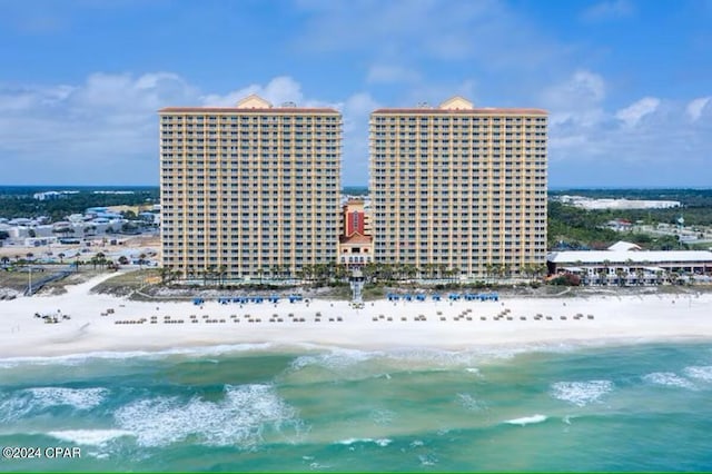 bird's eye view with a view of the beach and a water view