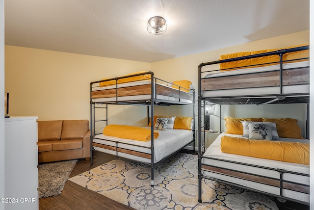 bedroom featuring wood-type flooring