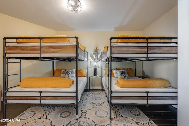 bedroom featuring hardwood / wood-style flooring