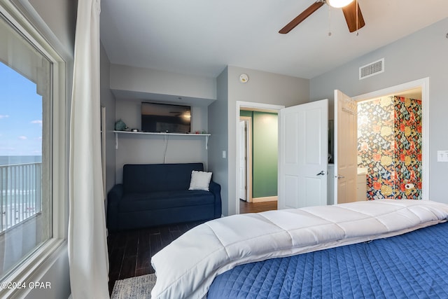 bedroom featuring ceiling fan and dark hardwood / wood-style flooring