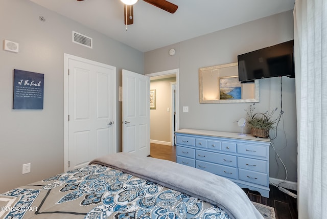 bedroom featuring ceiling fan and hardwood / wood-style flooring