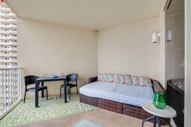 bedroom with concrete flooring