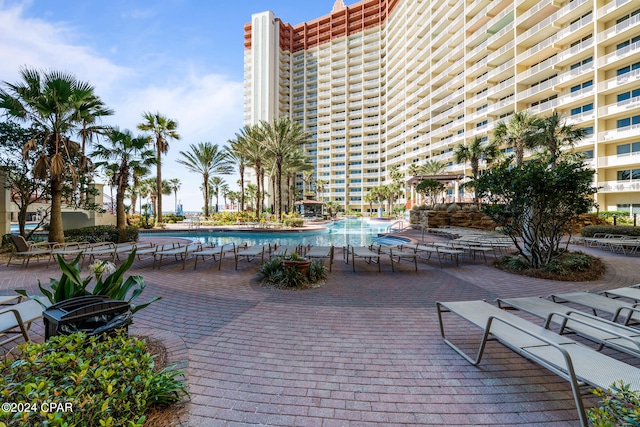 view of patio featuring a community pool