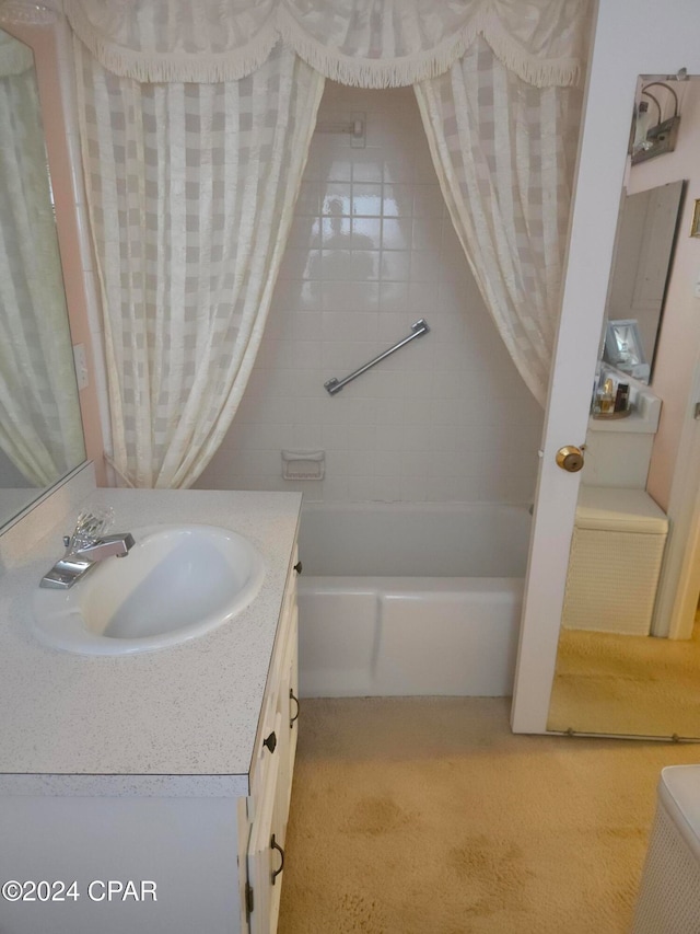 full bathroom featuring shower / bath combo, vanity, and toilet