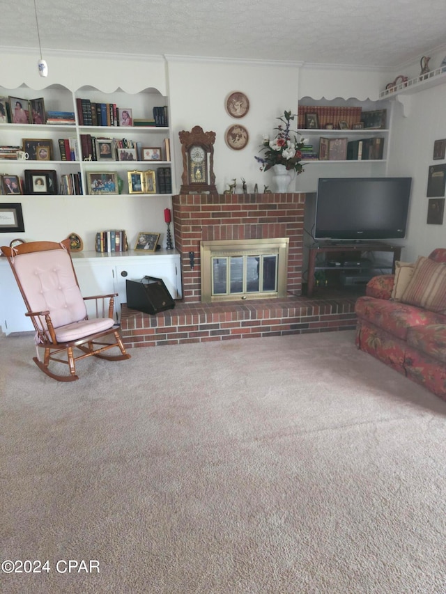 living room featuring a brick fireplace, a textured ceiling, and carpet floors