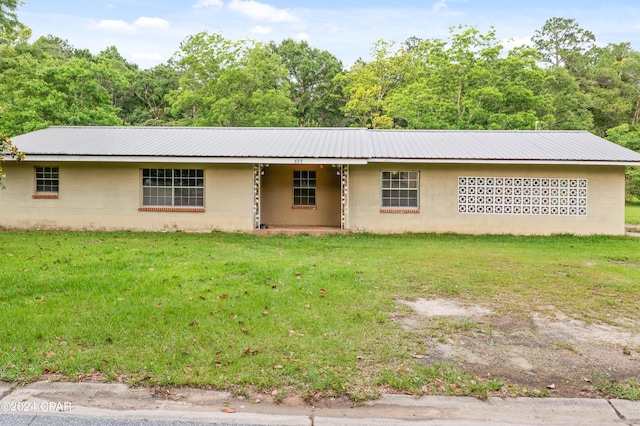 exterior space featuring a front lawn