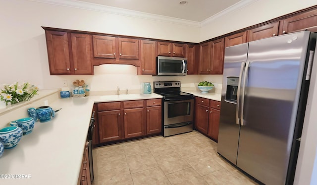 kitchen featuring crown molding, stainless steel appliances, and light tile patterned flooring