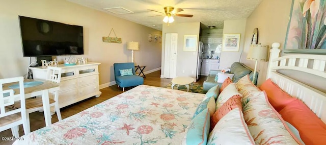 bedroom featuring dark wood-type flooring and baseboards