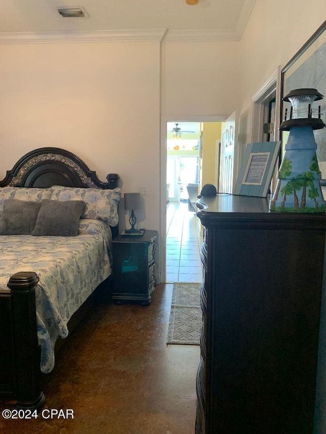 bedroom with crown molding