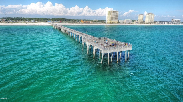 view of swimming pool with a water view