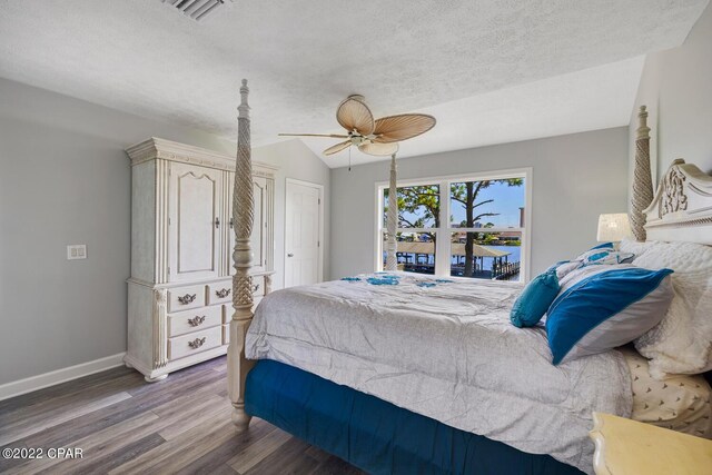 bedroom featuring ceiling fan and hardwood / wood-style flooring