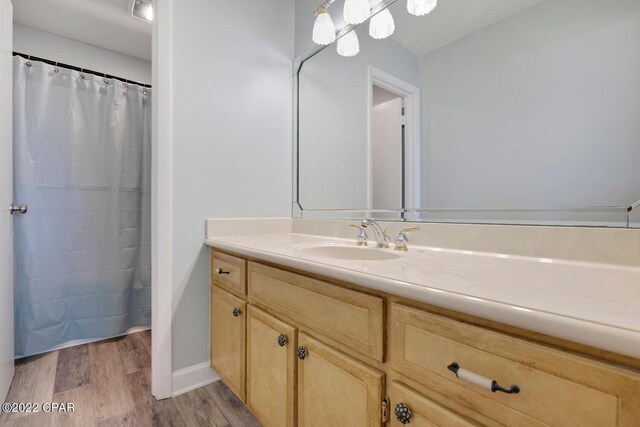 kitchen featuring appliances with stainless steel finishes, white cabinetry, and sink