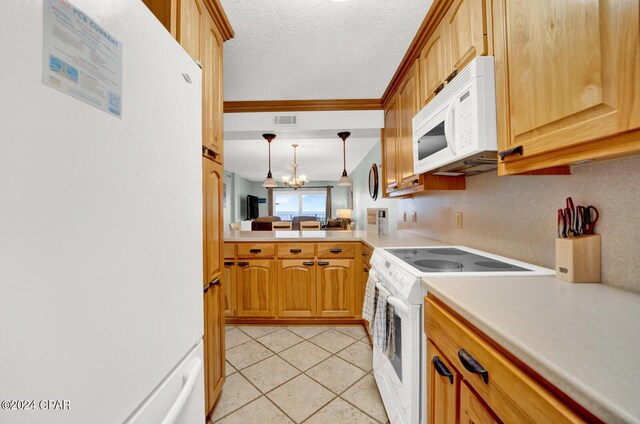 kitchen with light tile patterned flooring, crown molding, white appliances, an inviting chandelier, and hanging light fixtures