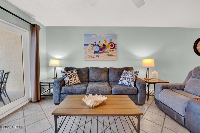 living room with tile patterned floors