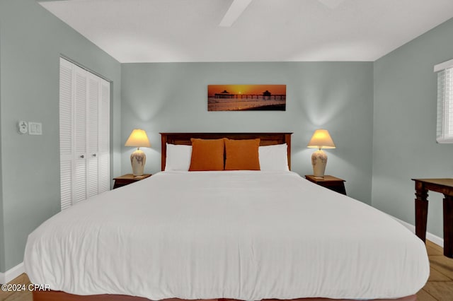 bedroom featuring ceiling fan and a closet